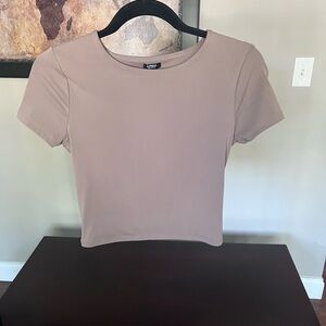 Cropped top by Express. Size small. Body contour line.